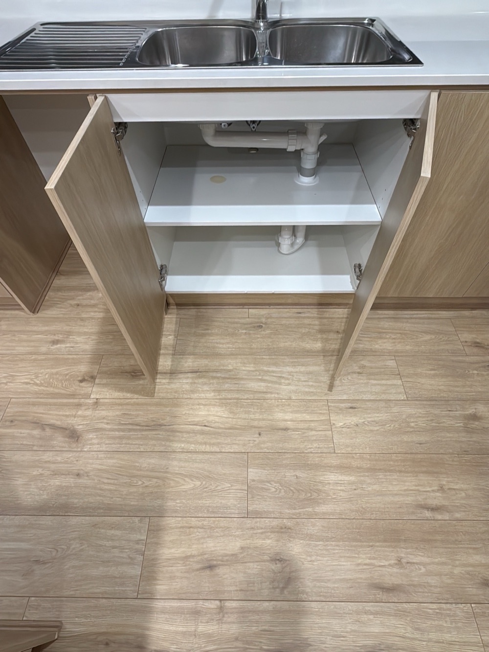 Mixer and pipework leaking at practical completion, recorded during a pre-handover inspection in Donnybrook