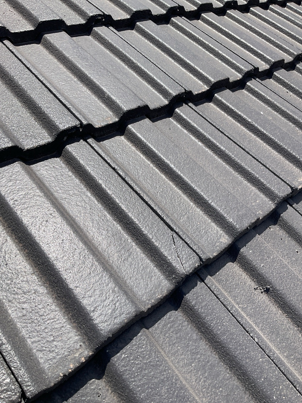 Additional cracked tiles across the roof, recorded during a pre-purchase inspection in Donnybrook