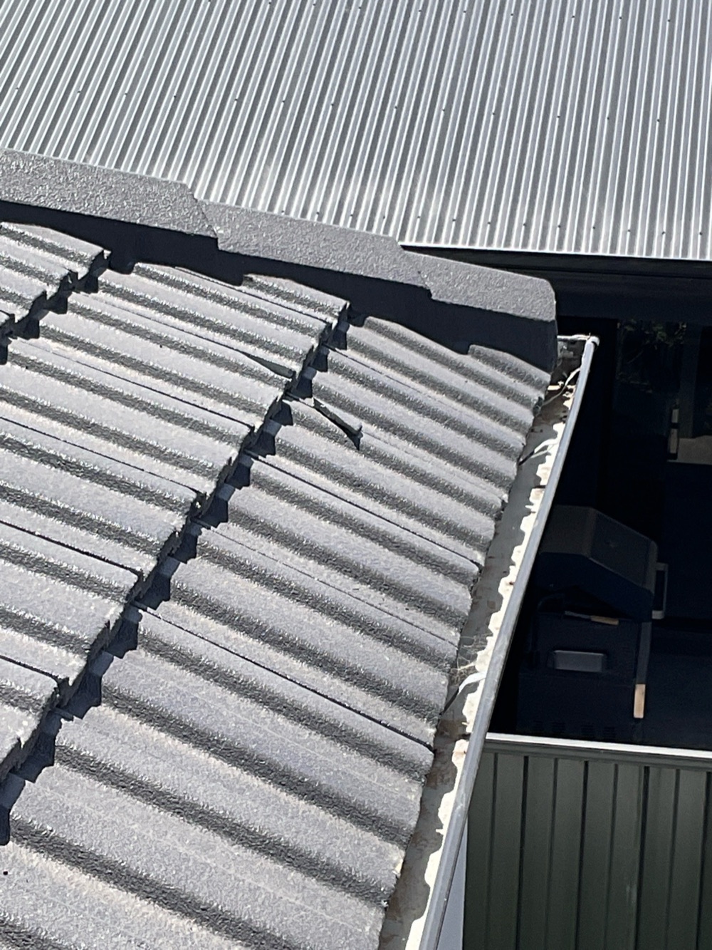 Broken roof tiles letting water into the roof space, recorded during a building and pest inspection in Donnybrook
